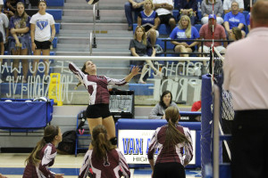 Raygan Cook goes for the kill near the net at Van Alstyne