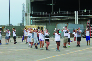 Princeton High marching band members practice amidst the construction at the high school.