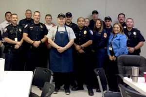 McKinney Fire Department Batallion Chief George Cook, center, brought a thank you lunch to the Princeton Police and Fire Departments for helping save his life July 13 when he was stabbed inside Walmart.